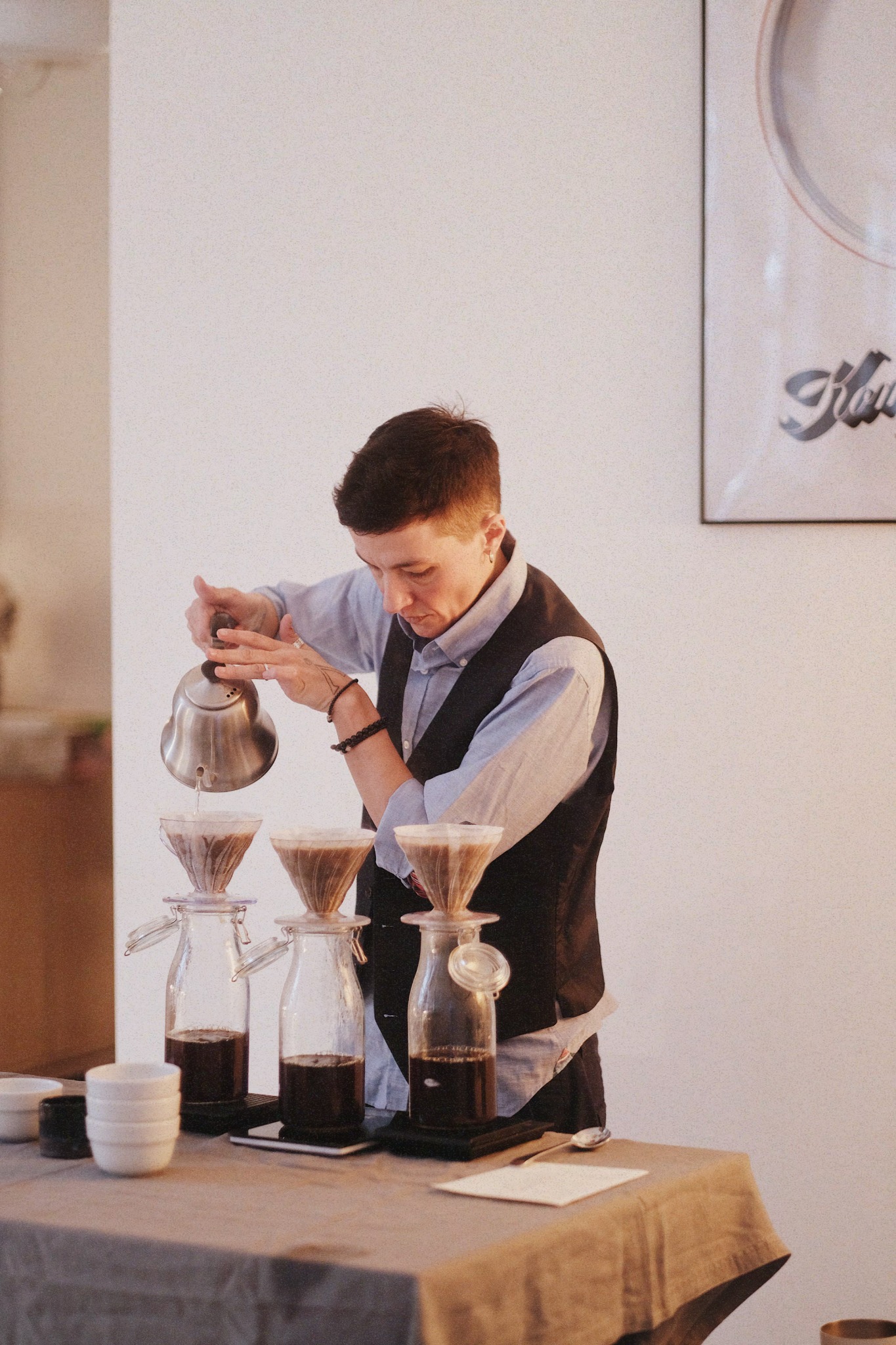 Iku preparing coffee